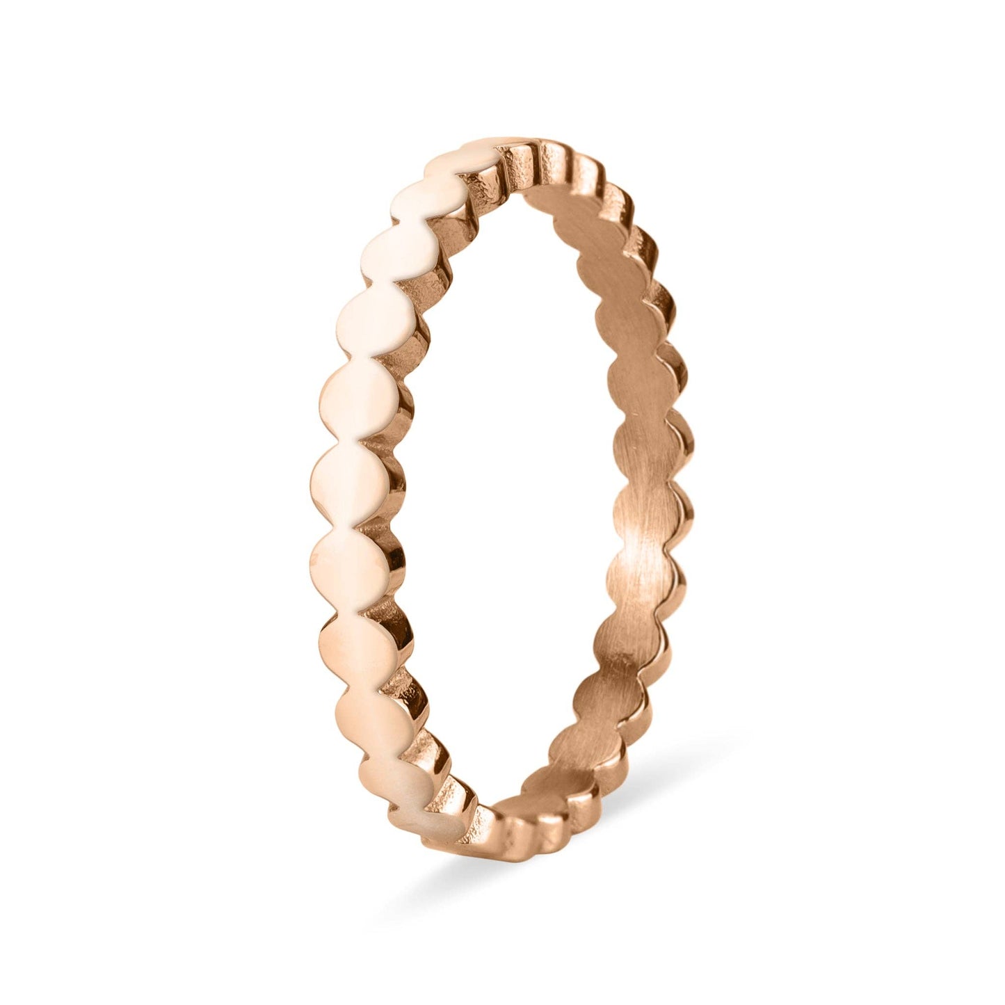 Rose gold ring with a textured design on a white background
