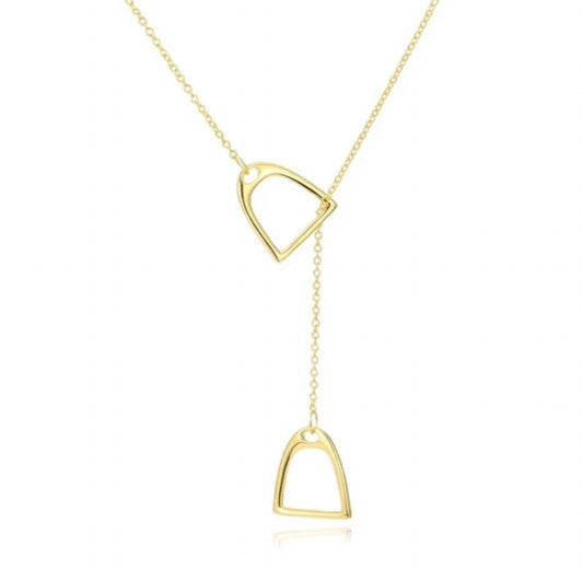 Gold necklace with two triangular pendants on a white background