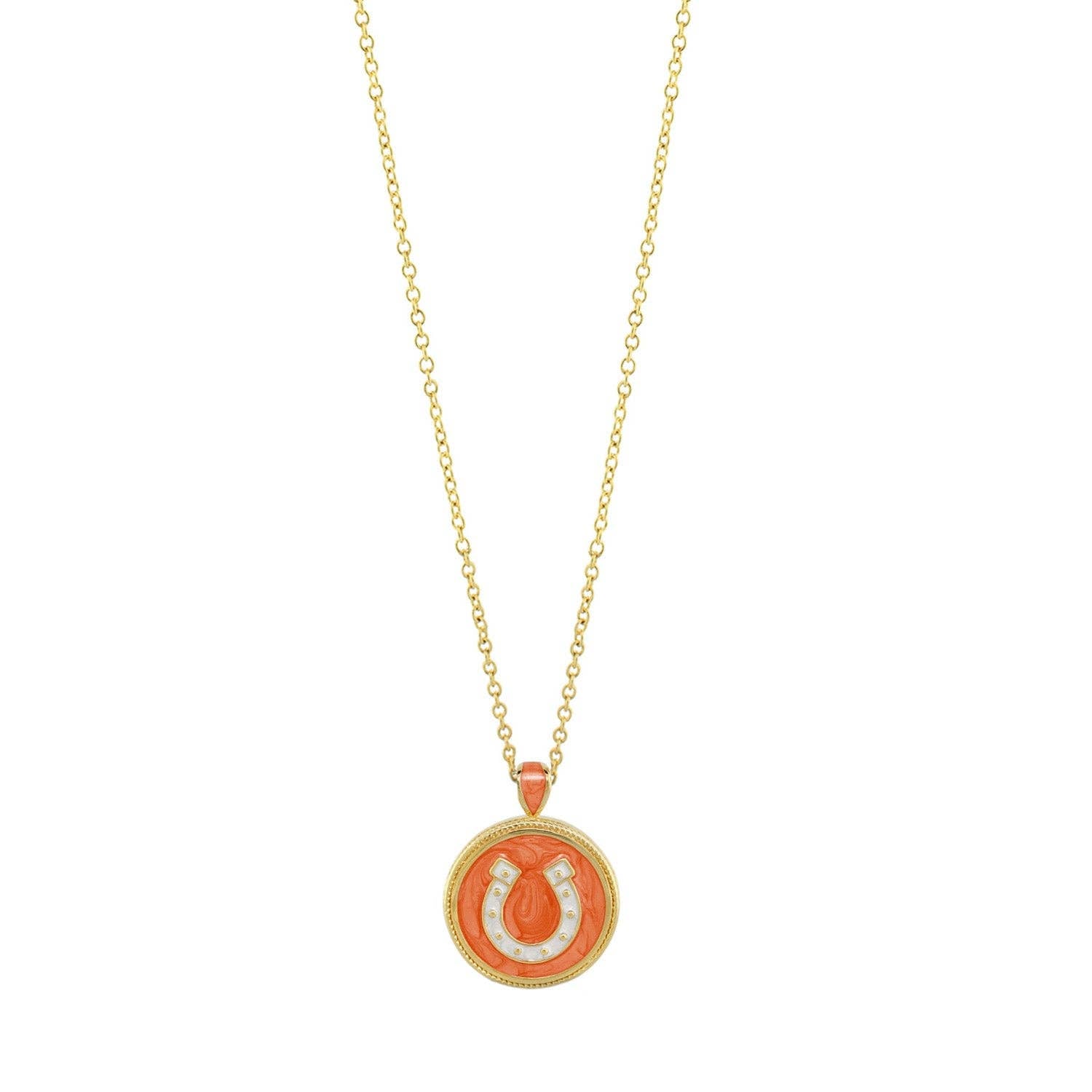 Necklace with a coral pendant featuring a horseshoe design on a white background