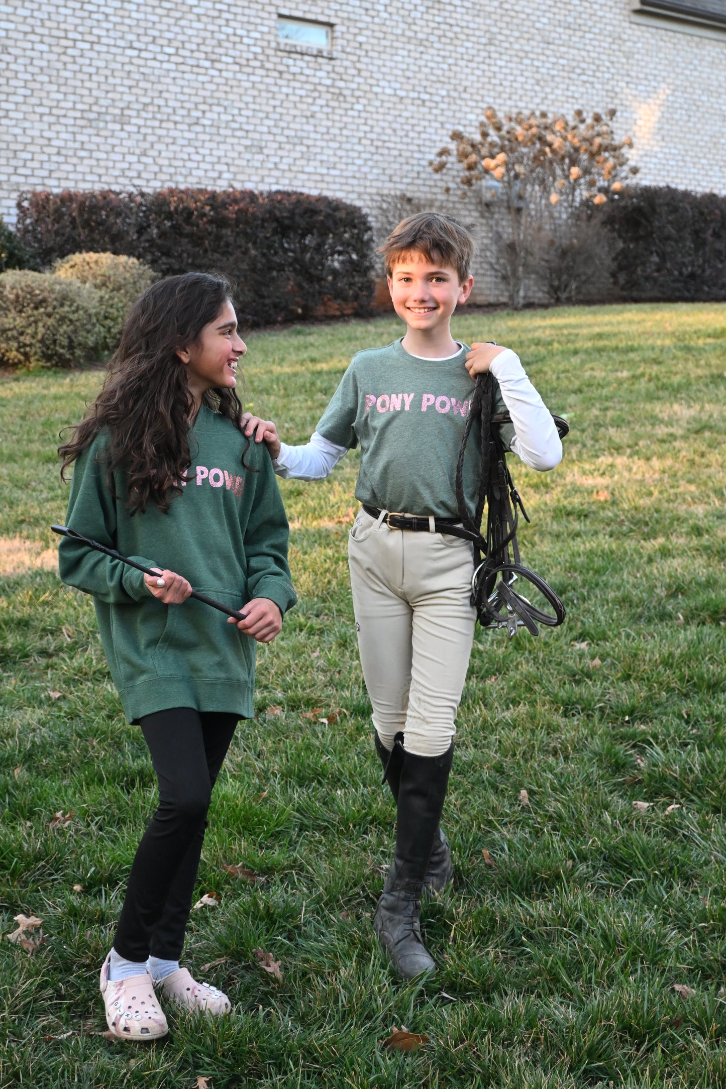 Youth-sized short sleeve t-shirt with "Pony Power" graphic, designed for young equestrian riders and horse lovers.