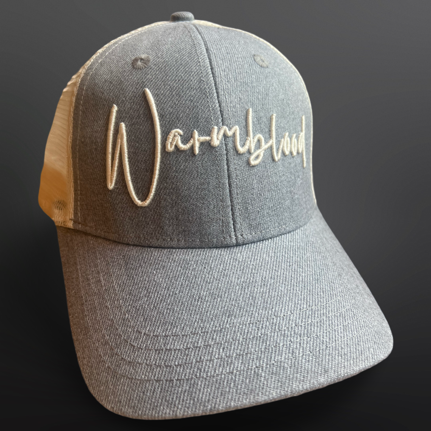 Warmblood baseball cap with denim fabric and off white embroidery, designed for comfortable everyday wear at the stables.