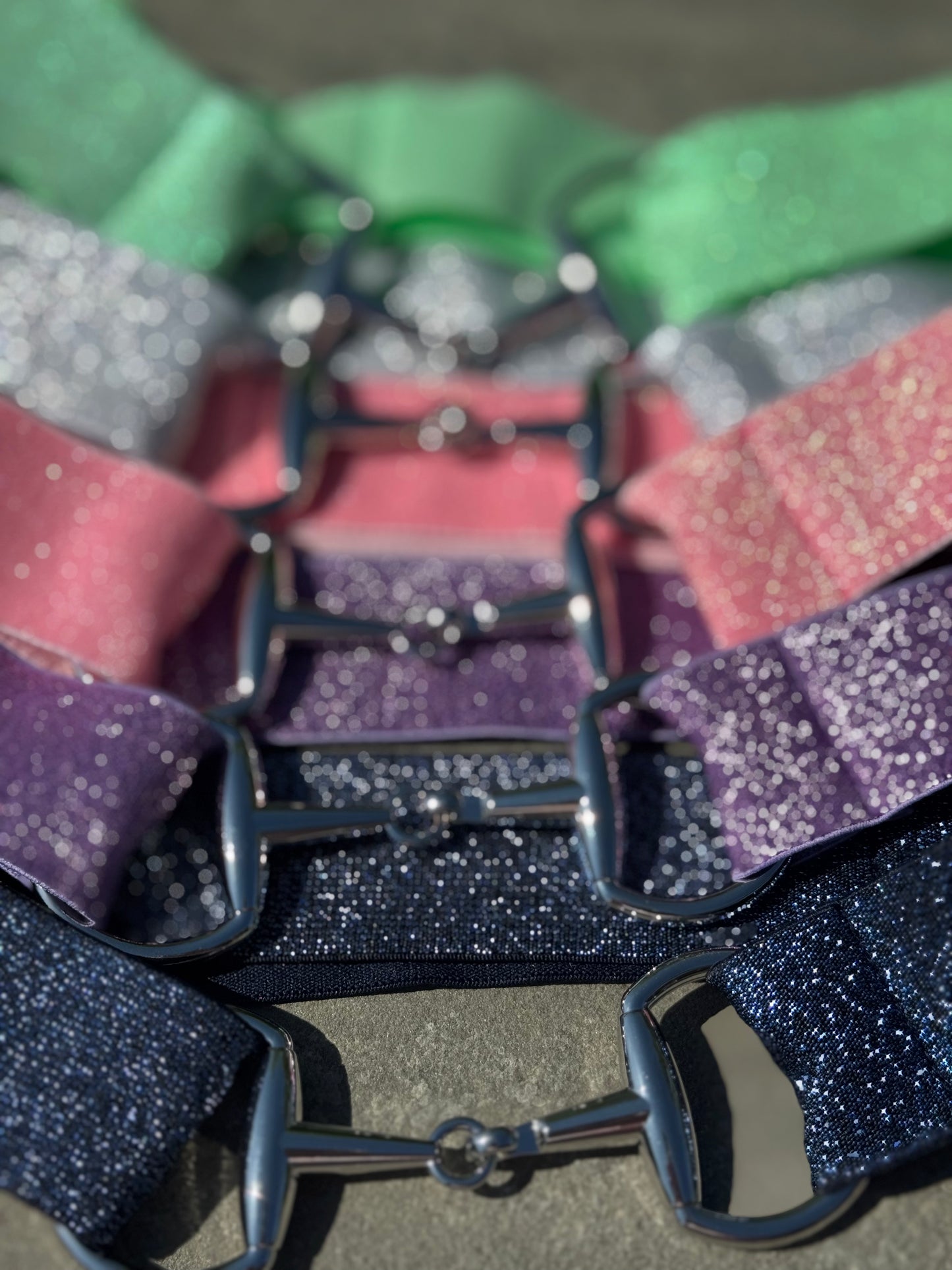 gift set of riding belts with a 1.5" snaffle bit buckle closure
