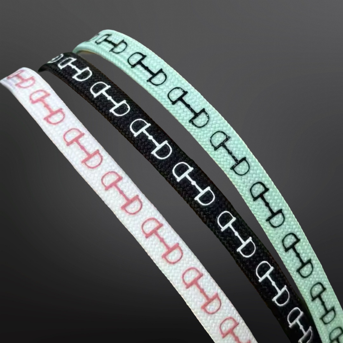 Stocking stuffer ideas for equestrians, shoe laces with a snaffle bit deaign