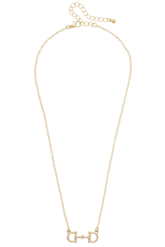 Gold necklace with a horse bit pendant on a white background