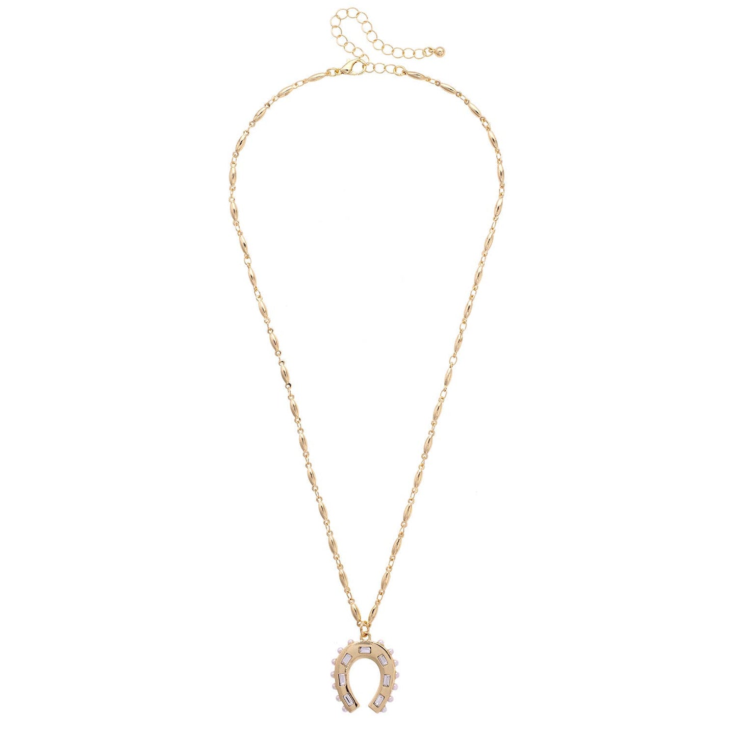 Gold necklace with a horseshoe pendant on a white background