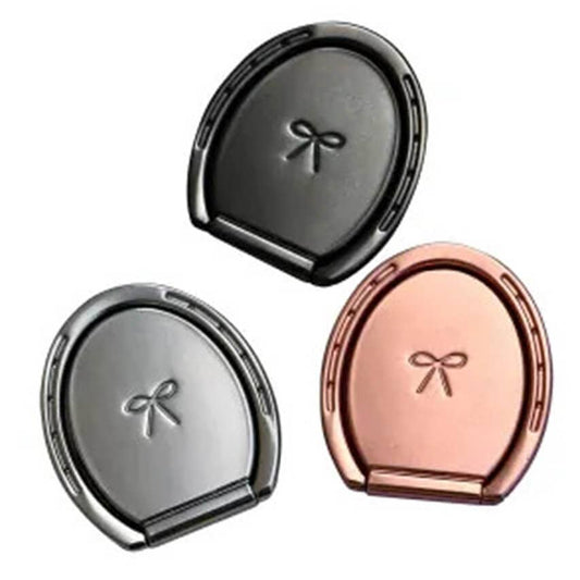 The phone stands shaped like horse shoes in three different colors, back silver and bronze