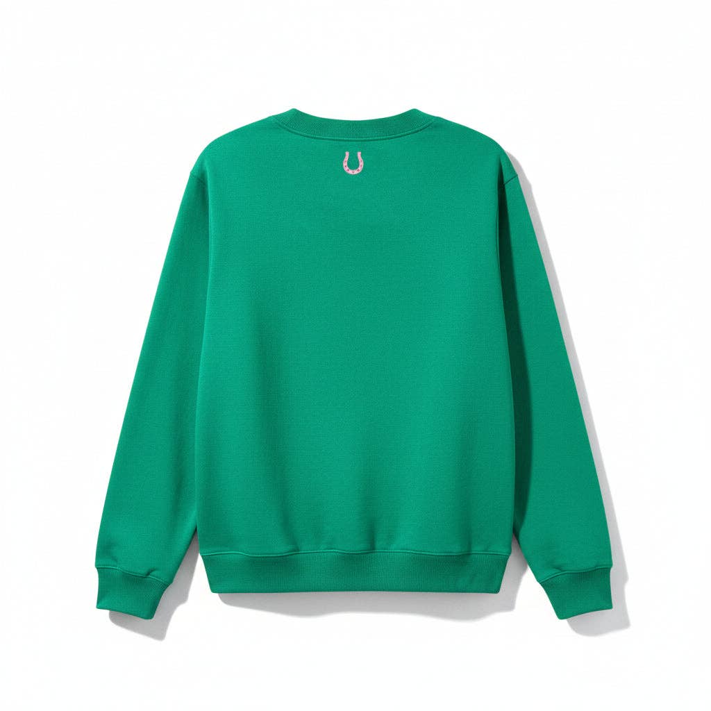Green sweatshirt on a white background with a pink horseshoe at the collar