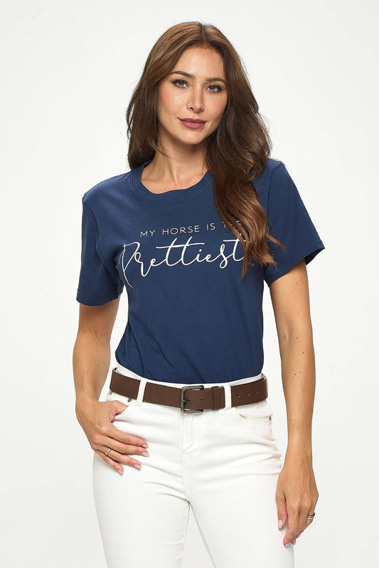 woman wearing a navy shirt with the graphic "my horse is the prettiest" on a white background