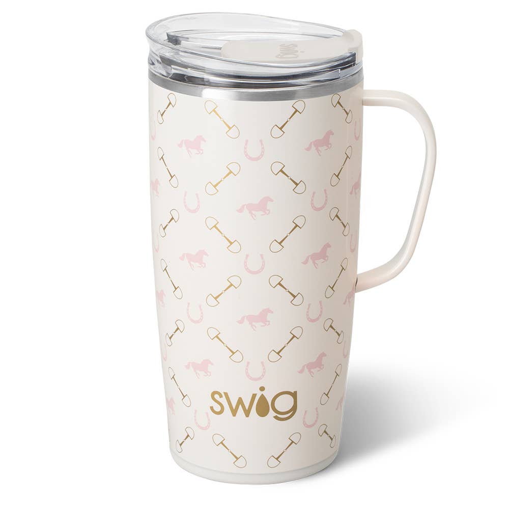A beige travel mug with pink horse patterns and gold details, featuring a handle and a clear lid, with the brand 'Swig' written on the front.