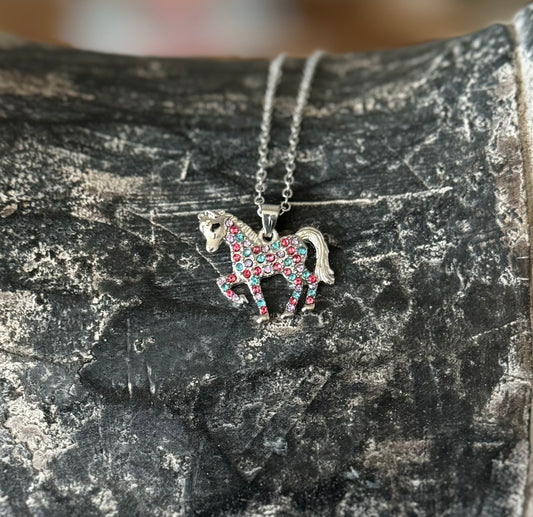Cute unicorn-shaped necklace featuring sparkling rhinestones, sized specifically for children, perfect for young equestrians.